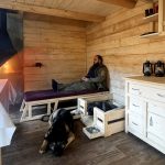 A Man Built a Log House in the Forest and Lives in It