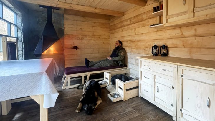 A Man Built a Log House in the Forest and Lives in It